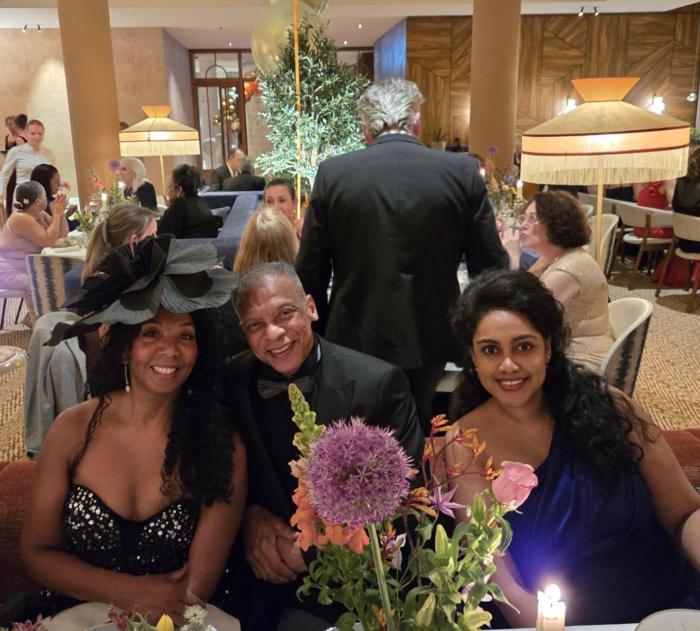 Sandra, Maikel, and family celebrating together